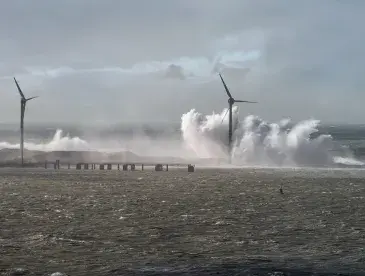 Turbine with crashing waves