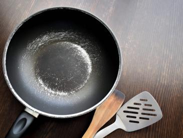 A nonstick pan with a scratched surface. Harmful forever chemicals, or PFAS, are still used in many nonstick pans